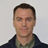 team member headshot of Mark Devore