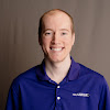 team member headshot of Justin Krizenesky