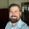 team member headshot of TJ McArthur